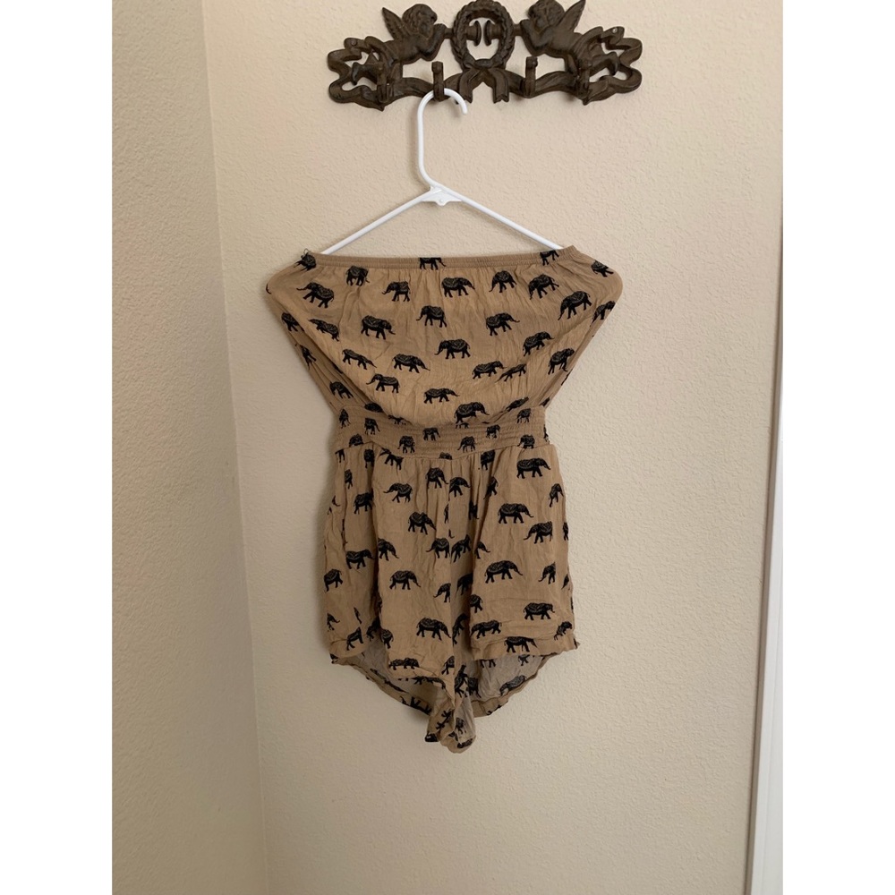 Sand-colored elephant romper